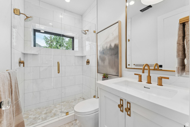 1400 Weber Wild Road Oakley, UT 84055 - Photo 43 of 55 Walk-in shower featuring a glass enclosure, dual showerheads, and a horizontal window
