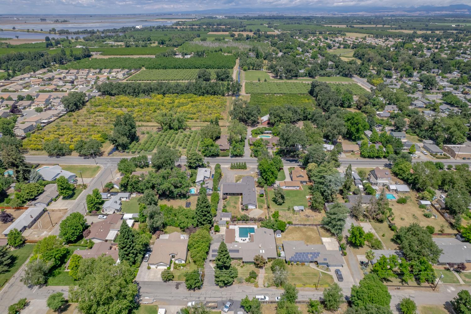 1880 Magnolia Street Gridley, CA 95948 - Photo 85 of 95 an aerial view of residential houses with outdoor space and city view