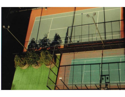 77 Pond Avenue, Unit 507 Brookline, MA 02445 - Photo 6 of 12 a view of a tennis court