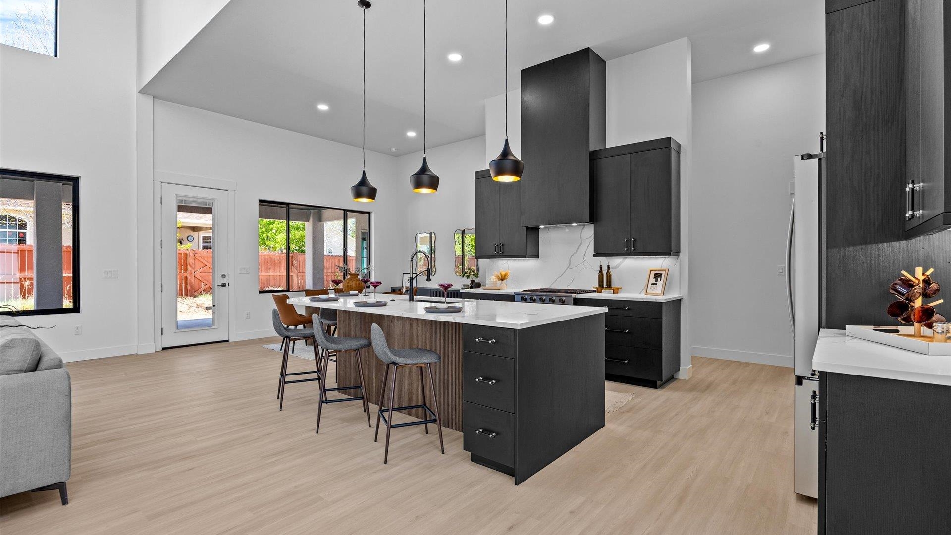 2045 Caleb Street Grand Junction, CO 81507 - Photo 12 of 42 a large kitchen with a table and chairs