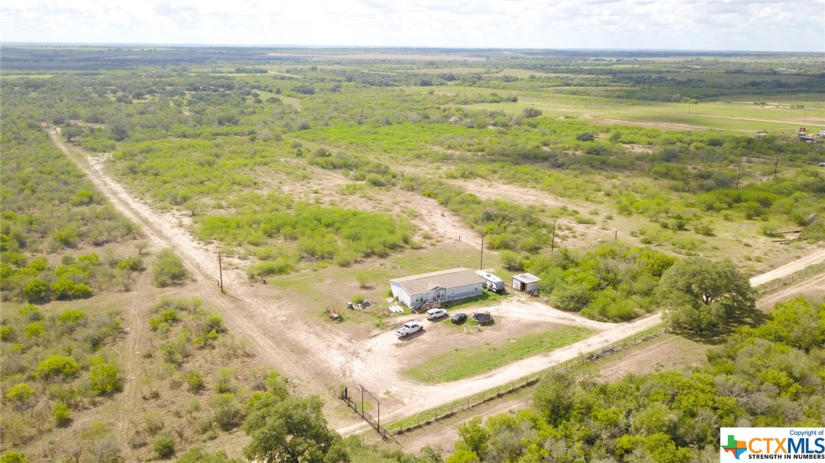 443 Joe Pokluda Road Nordheim, TX 78141 - Photo 1 of 26 a view of lake view and mountain