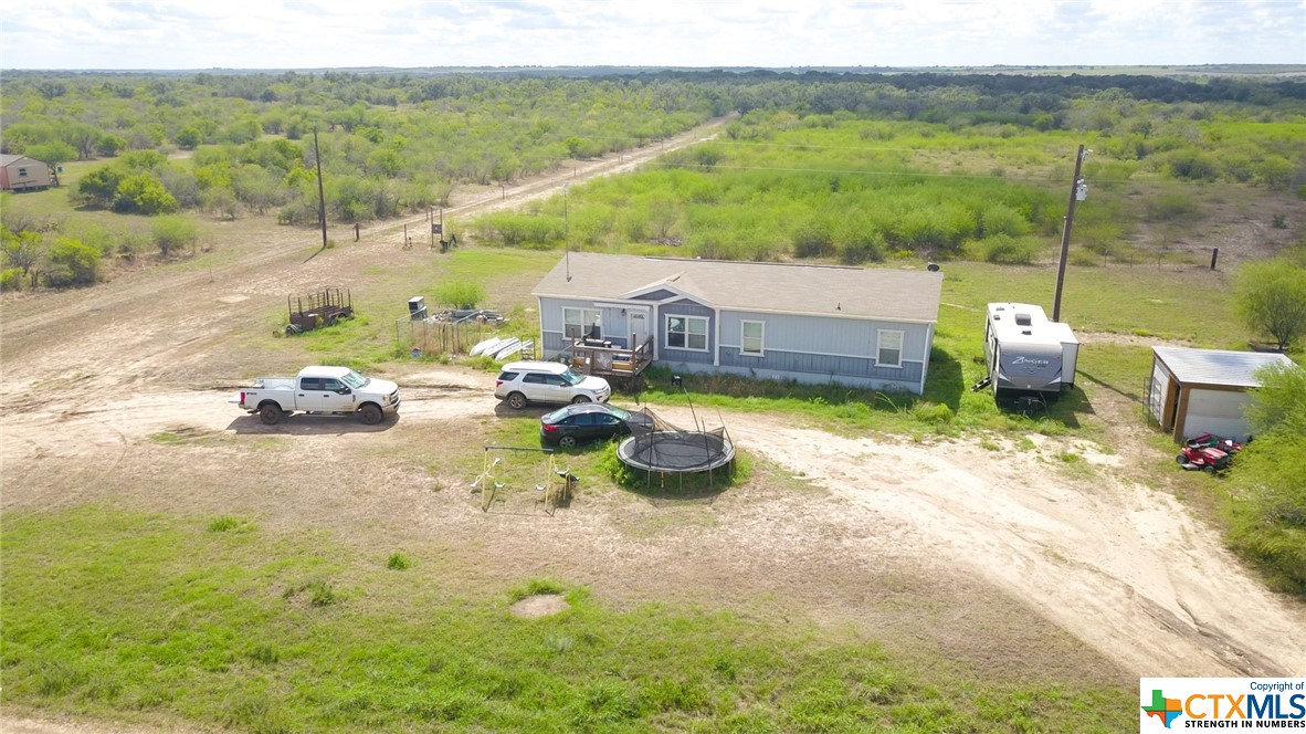 443 Joe Pokluda Road Nordheim, TX 78141 - Photo 4 of 26 a view of a ocean view with a lounge chair