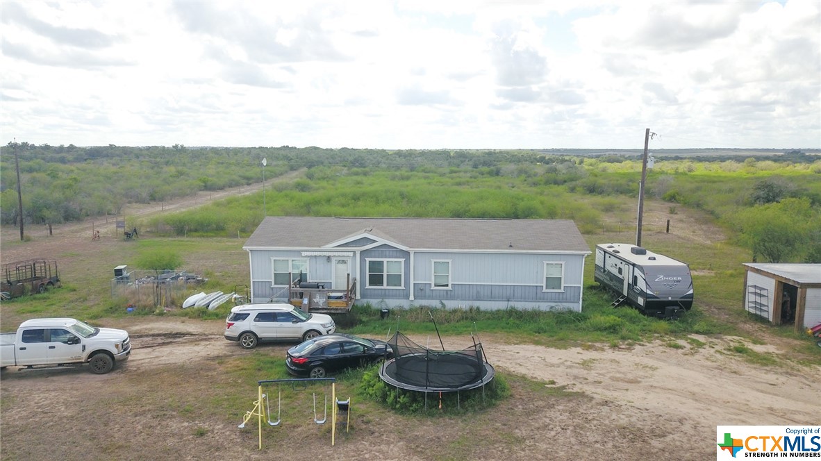 443 Joe Pokluda Road Nordheim, TX 78141 - Photo 8 of 26 a view of a patio in backyard
