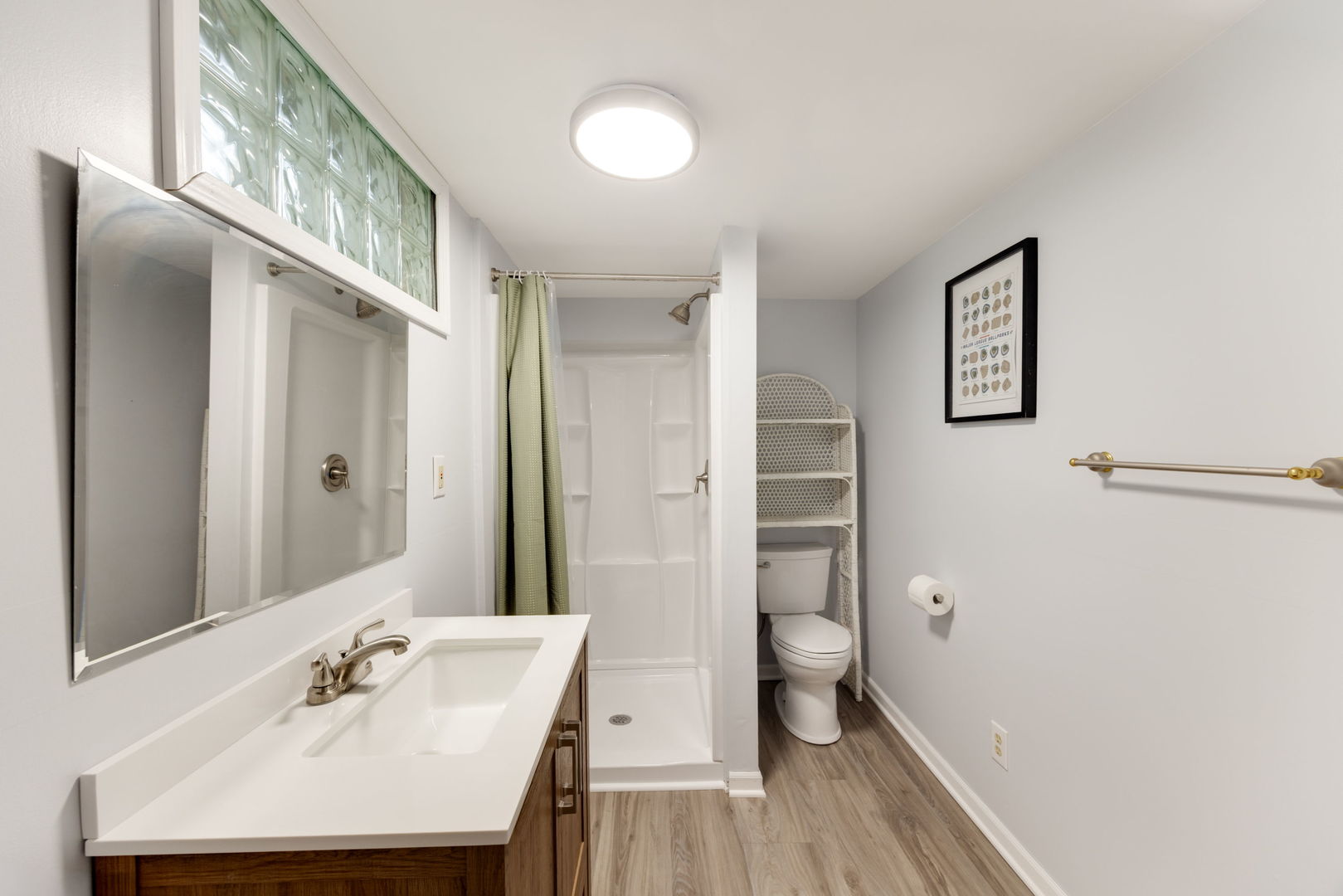 4N285 LaFox Road St. Charles, IL 60175 - Photo 13 of 17 a bathroom with a sink a toilet and shower