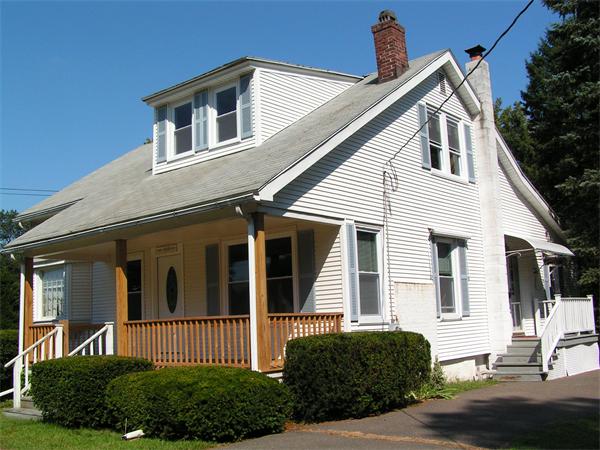 118 Little River Road Westfield, MA 01085 - Photo 1 of 18 a front view of a house with a yard