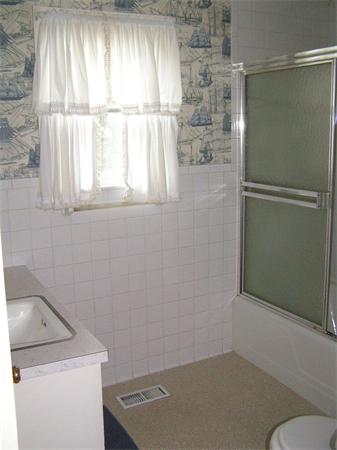 118 Little River Road Westfield, MA 01085 - Photo 13 of 18 a bathroom with a window and a shower