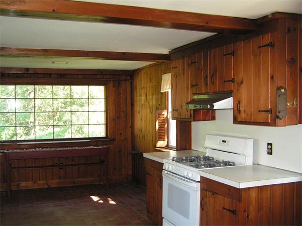 118 Little River Road Westfield, MA 01085 - Photo 6 of 18 a kitchen with a stove a sink and a microwave