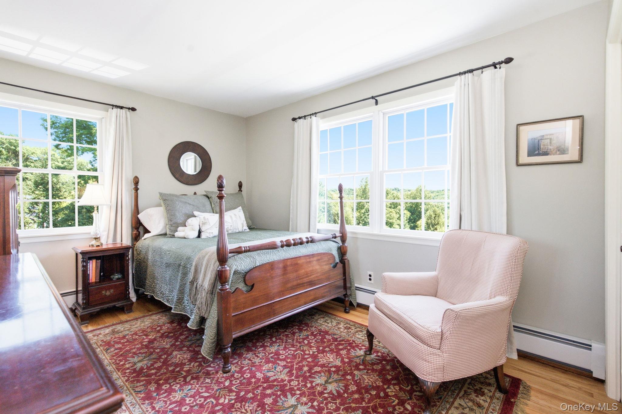 32 Bedell Road Katonah, NY 10536 - Photo 24 of 49 Windows on two exposures give this corner bedroom treetop views.