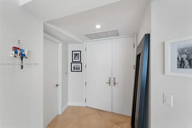a view of a hallway with closet