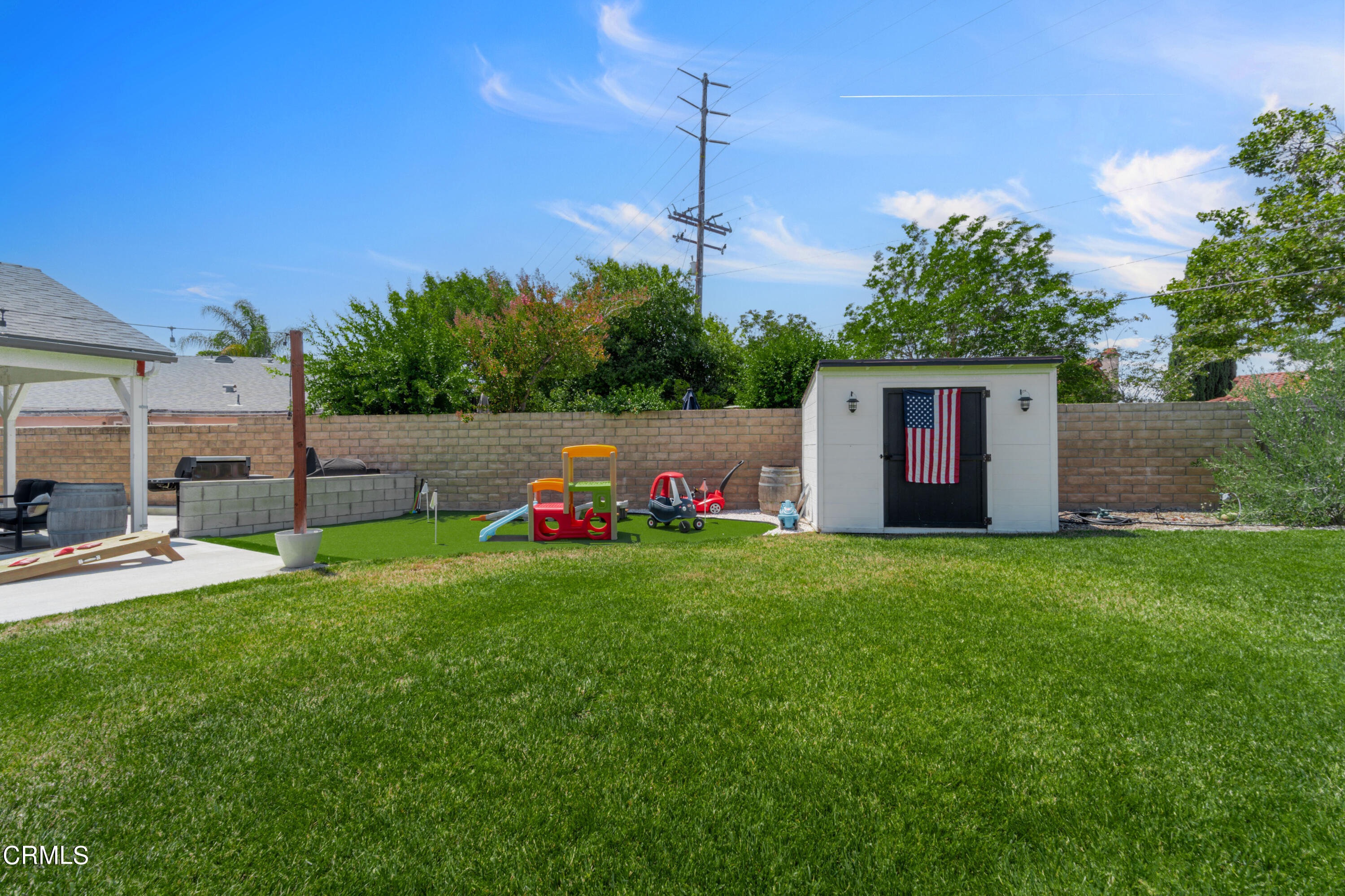 13211 Laurelhurst Road Moorpark, CA 93021 - Photo 39 of 52 a backyard of a house with table and chairs