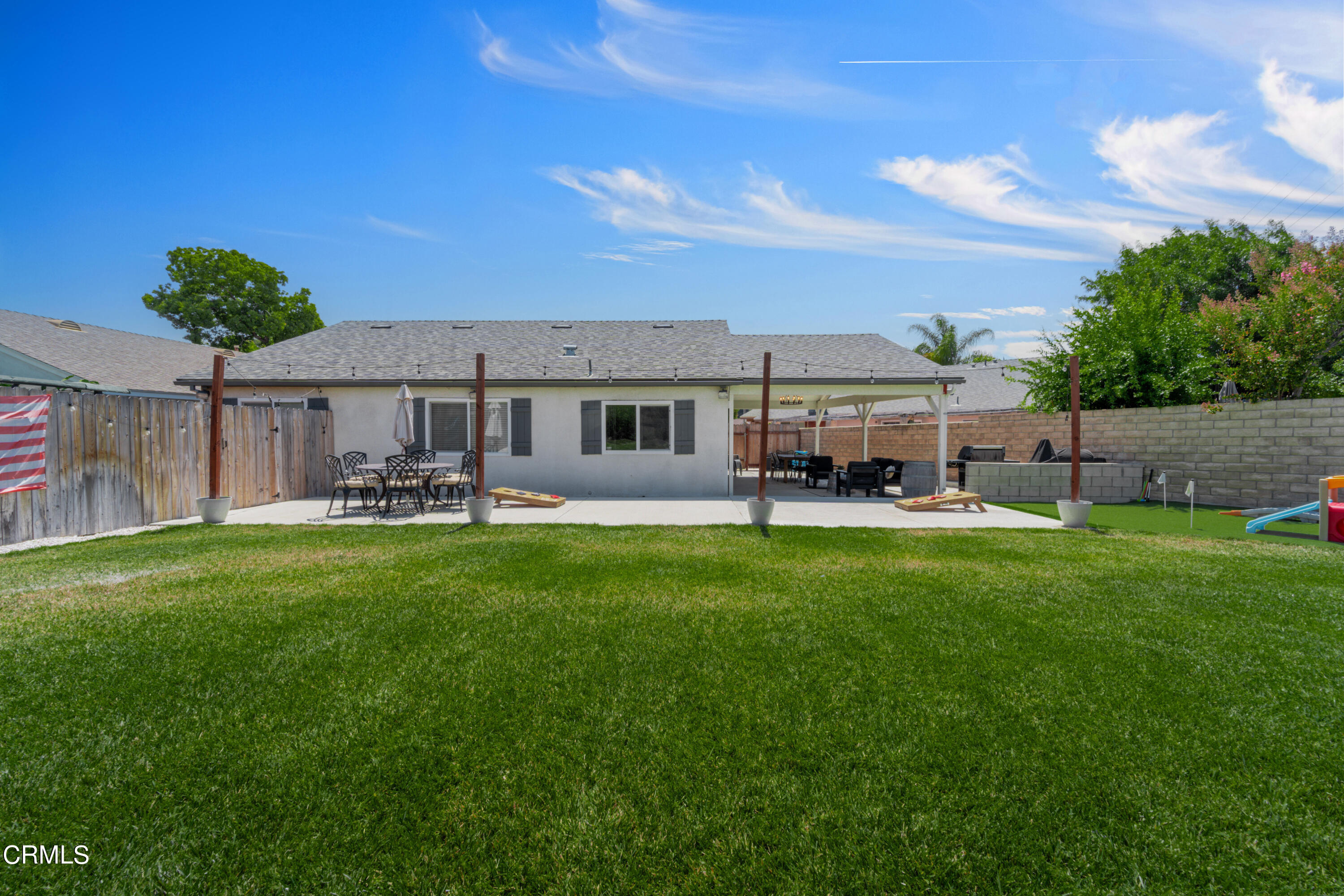 13211 Laurelhurst Road Moorpark, CA 93021 - Photo 40 of 52 a view of a house with a backyard porch and sitting area