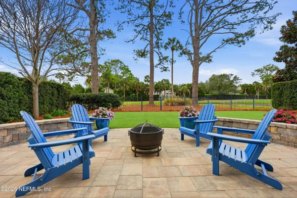 a view of a house with pool and yard