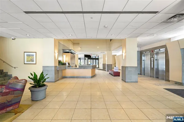 a view of staircase with a large window
