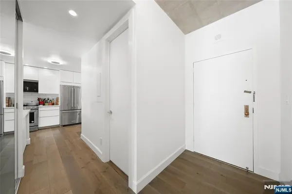 a view of a kitchen with a sink
