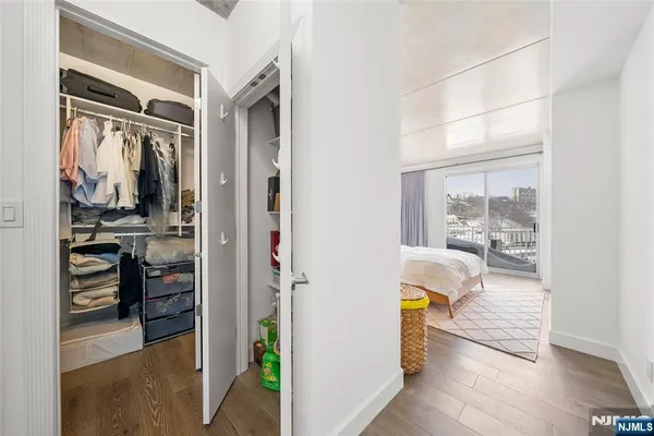 a view of living room with furniture and a window
