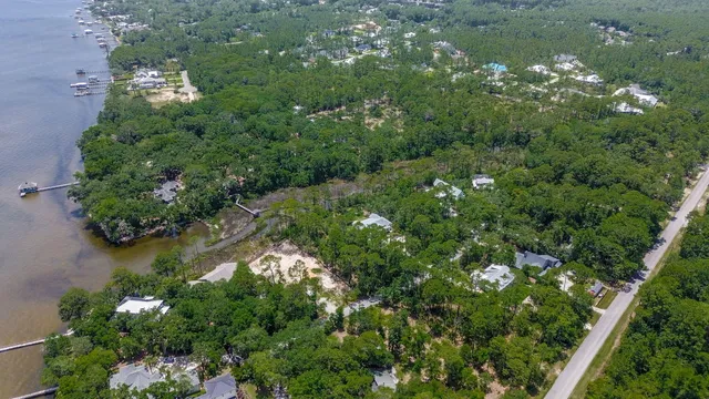 a aerial view of a house with a yard