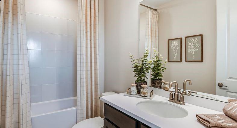 621 Se Ranch Palm City, FL 34990 - Photo 13 of 33 a bathroom with a sink and a mirror