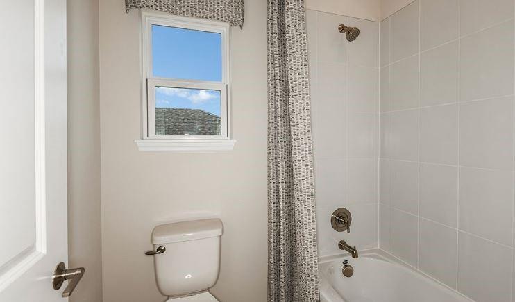 621 Se Ranch Palm City, FL 34990 - Photo 14 of 33 a bathroom with a granite countertop bathtub shower