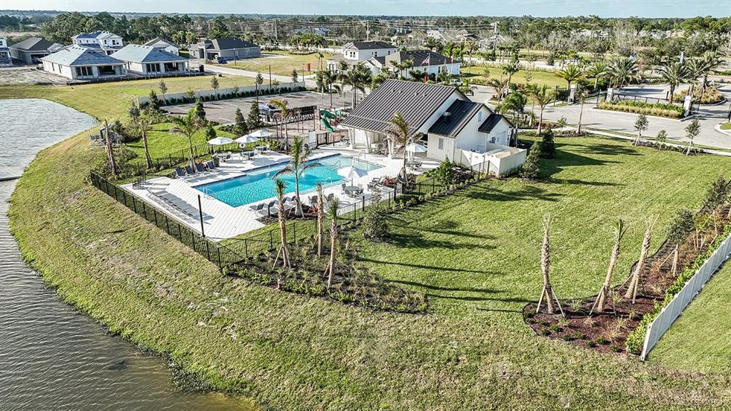 621 Se Ranch Palm City, FL 34990 - Photo 22 of 33 an aerial view of a house with a ocean view