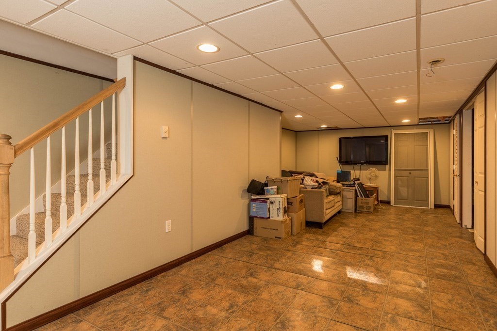 14 Deer Path, Unit 6 Maynard, MA 01754 - Photo 12 of 20 a view of a room with gym equipment