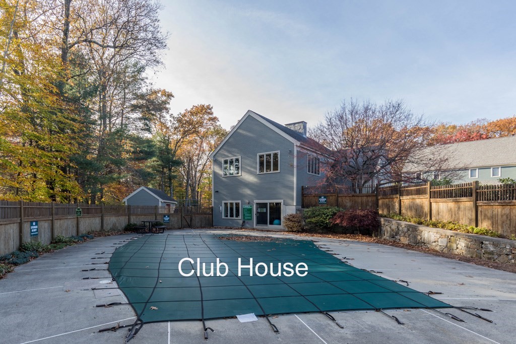 14 Deer Path, Unit 6 Maynard, MA 01754 - Photo 15 of 20 a front view of a house with a garden