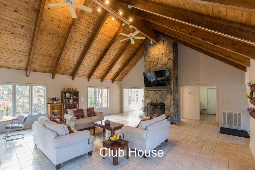 14 Deer Path, Unit 6 Maynard, MA 01754 - Photo 17 of 20 a living room with furniture and fireplace