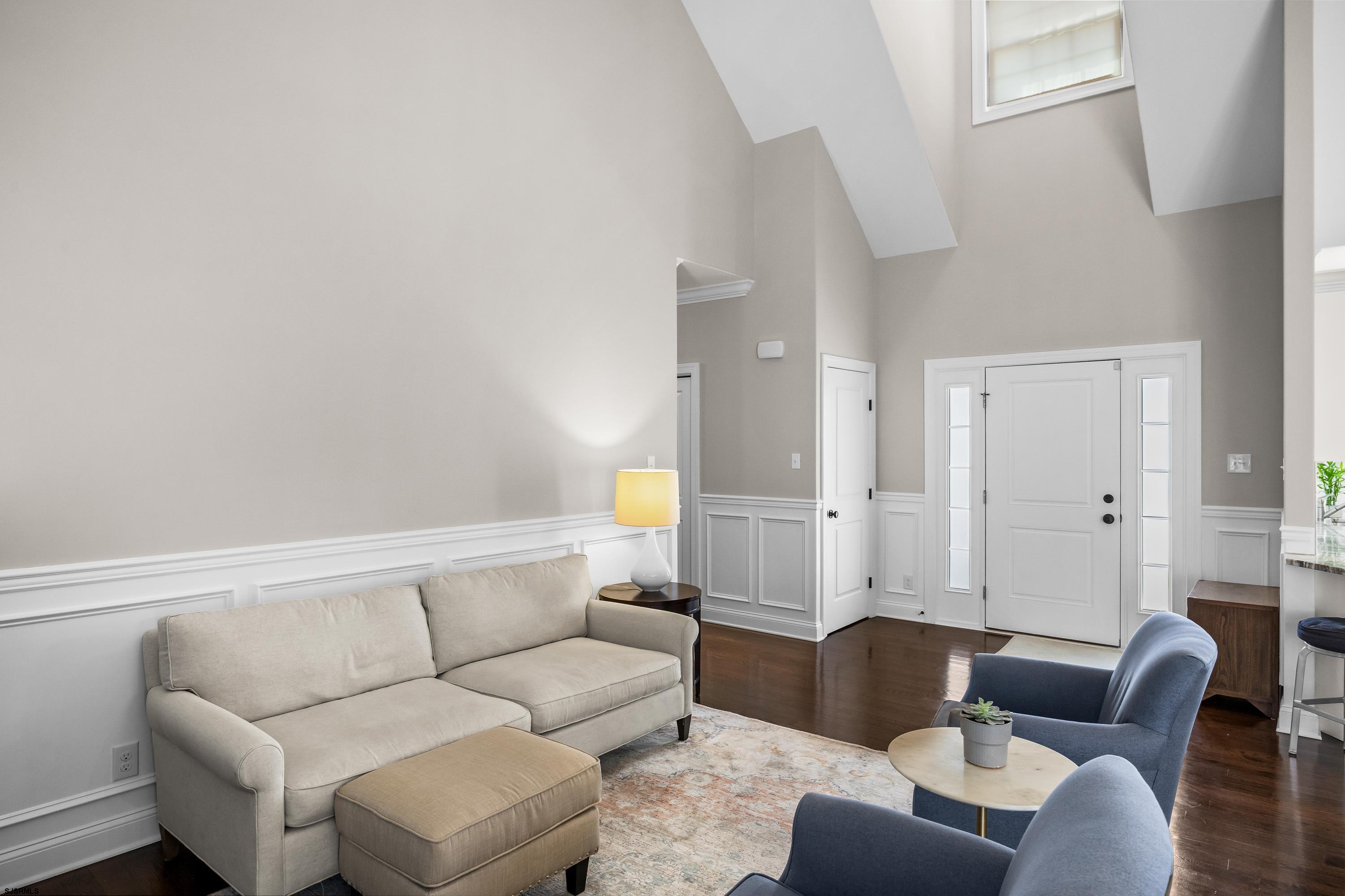 215 Surf Road Egg Harbor Township, NJ 08234 - Photo 7 of 31 a living room with furniture and a couch