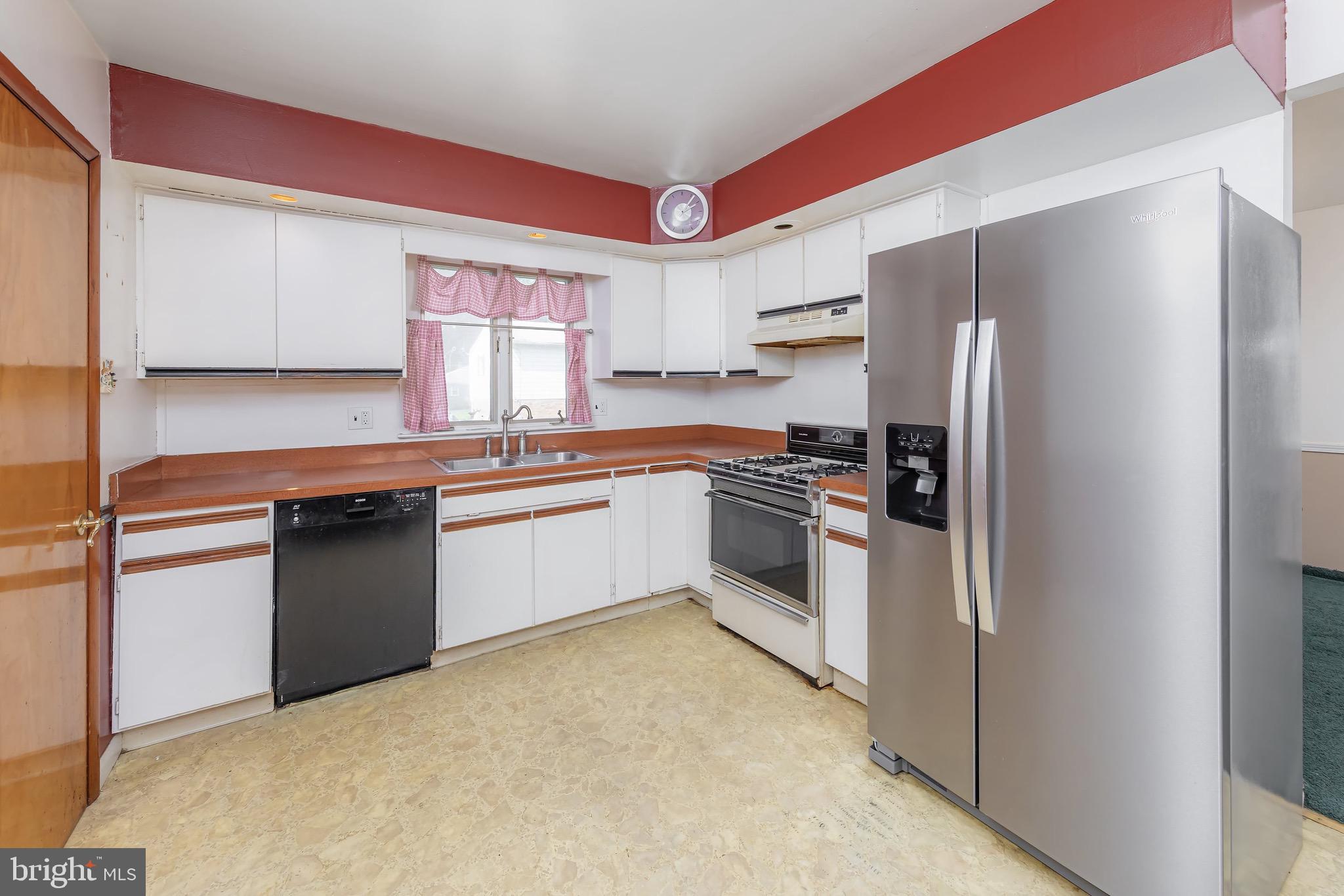 222 Nicholson Road Mount Ephraim, NJ 08059 - Photo 4 of 15 a kitchen with a sink stove and refrigerator