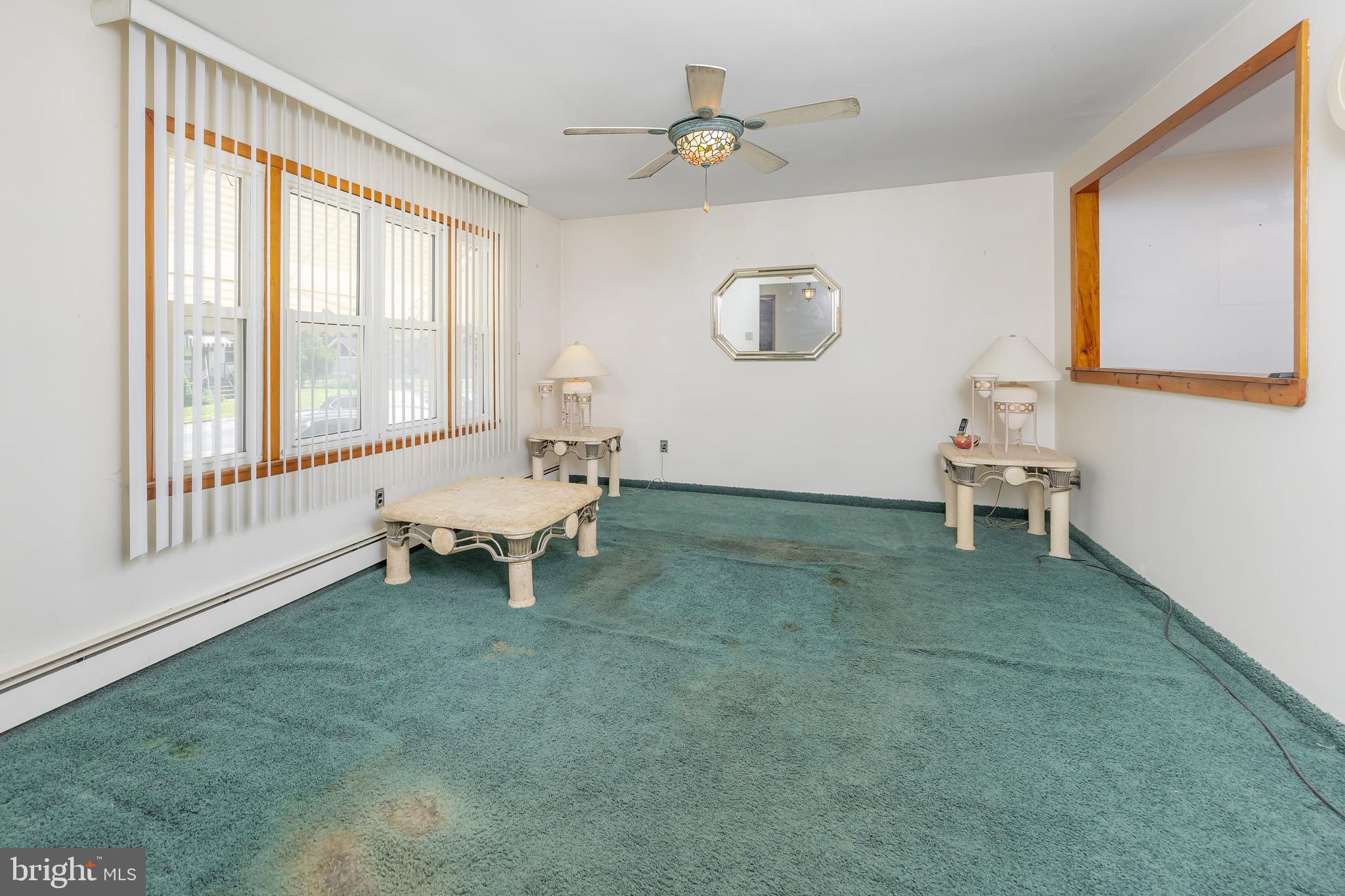 222 Nicholson Road Mount Ephraim, NJ 08059 - Photo 7 of 15 a living room with furniture and a window