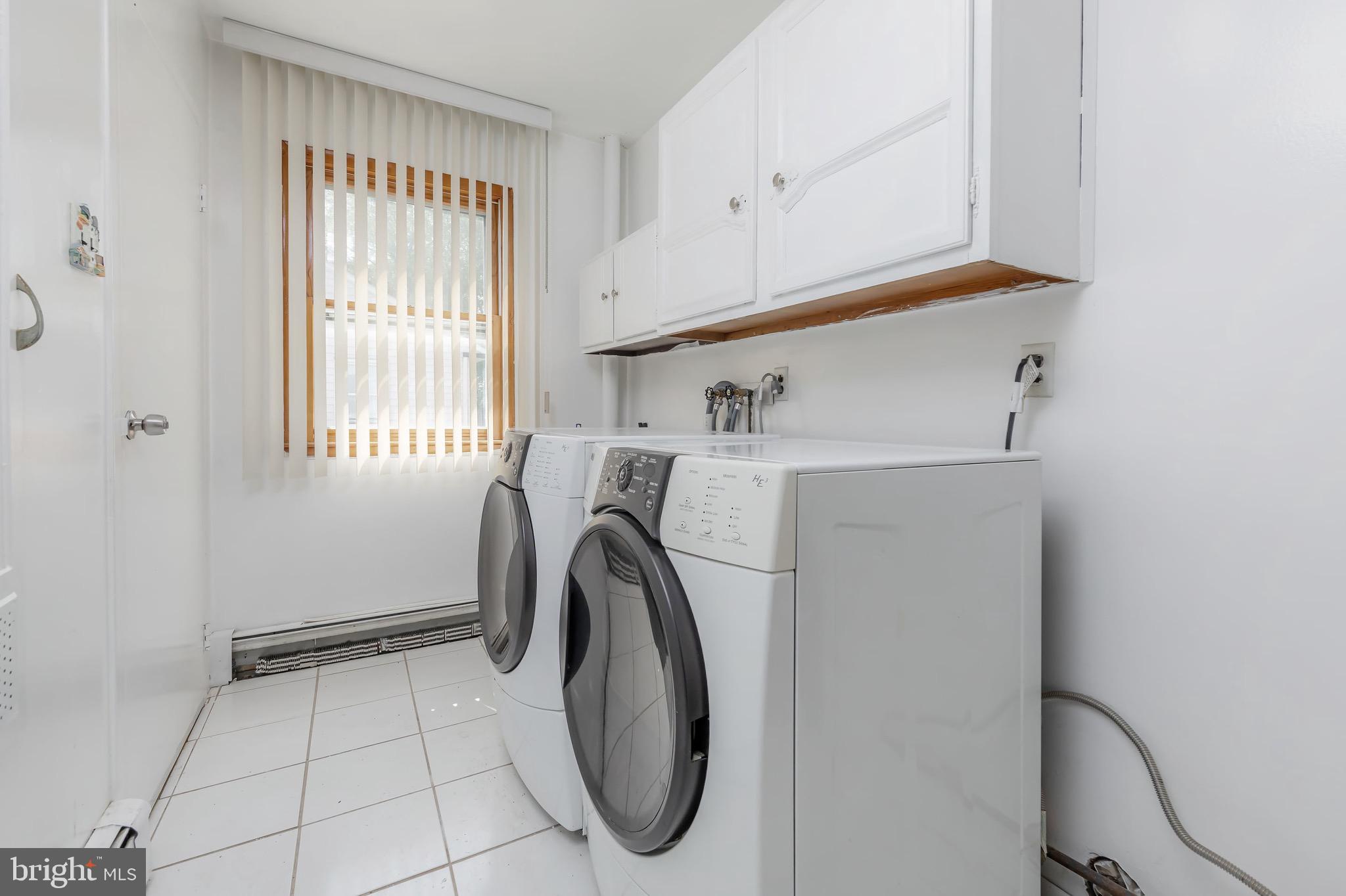 222 Nicholson Road Mount Ephraim, NJ 08059 - Photo 8 of 15 a utility room with dryer and washer
