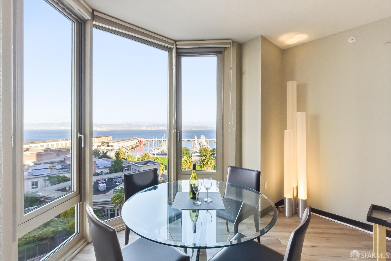 88 King Street, Unit 907 San Francisco, CA 94107 - Photo 11 of 51 a dining room with furniture and wooden floor