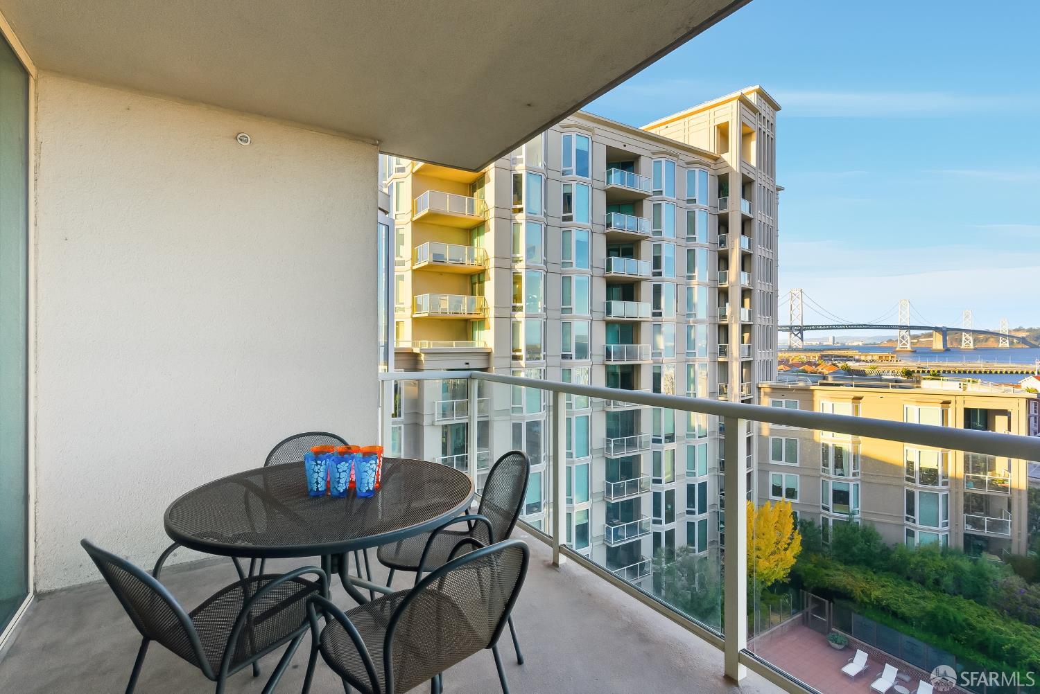 88 King Street, Unit 907 San Francisco, CA 94107 - Photo 14 of 51 a porch area with table and chairs