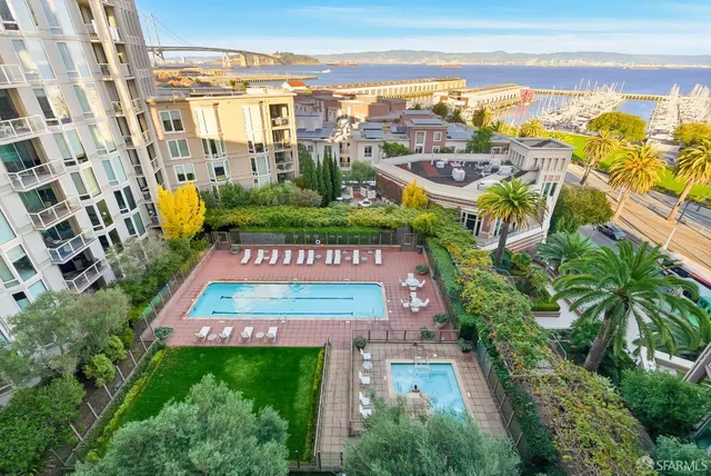 a picture of a bathroom with a mirror and a window