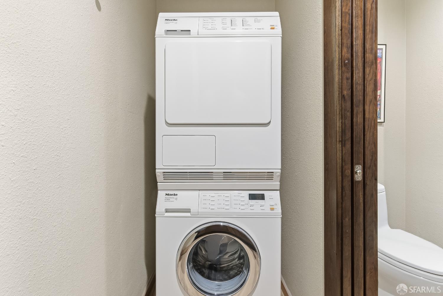 88 King Street, Unit 907 San Francisco, CA 94107 - Photo 25 of 51 a close up view of a washer and dryer