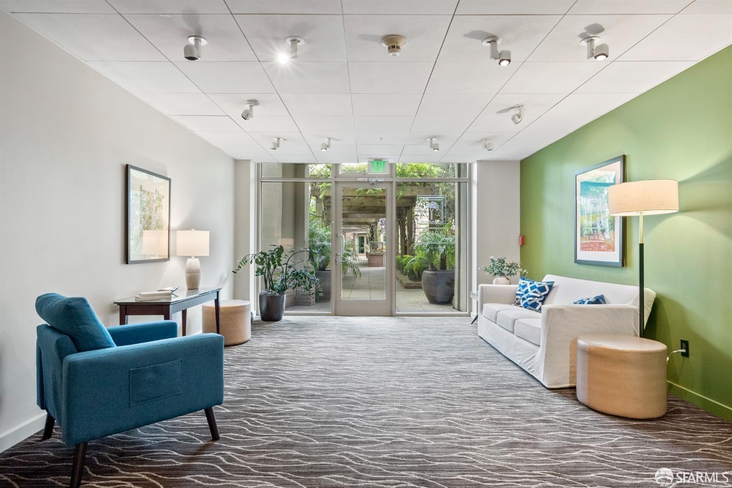 88 King Street, Unit 907 San Francisco, CA 94107 - Photo 33 of 51 a living room with furniture and a large window