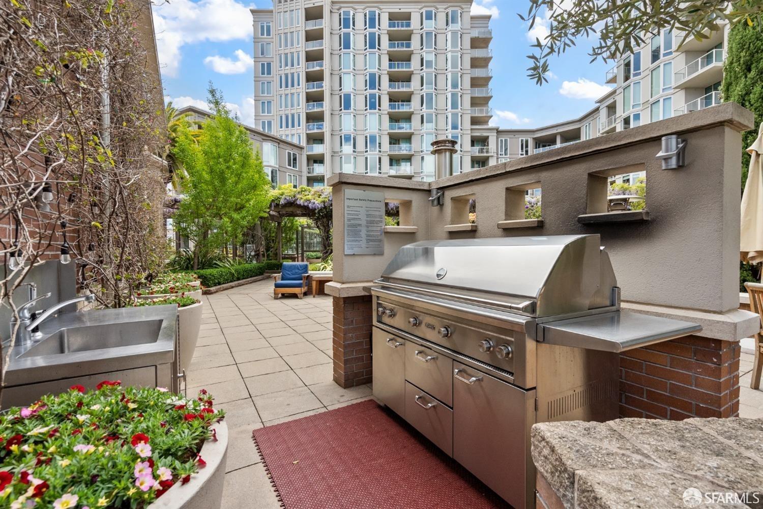 88 King Street, Unit 907 San Francisco, CA 94107 - Photo 47 of 51 a view of a kitchen with a sink and a stove