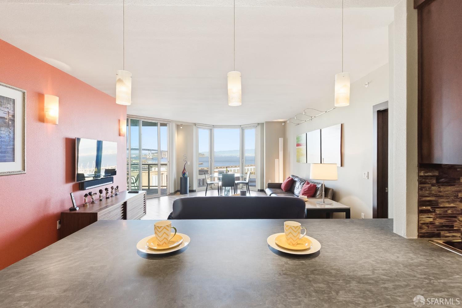 88 King Street, Unit 907 San Francisco, CA 94107 - Photo 5 of 51 a living room with furniture and a large window