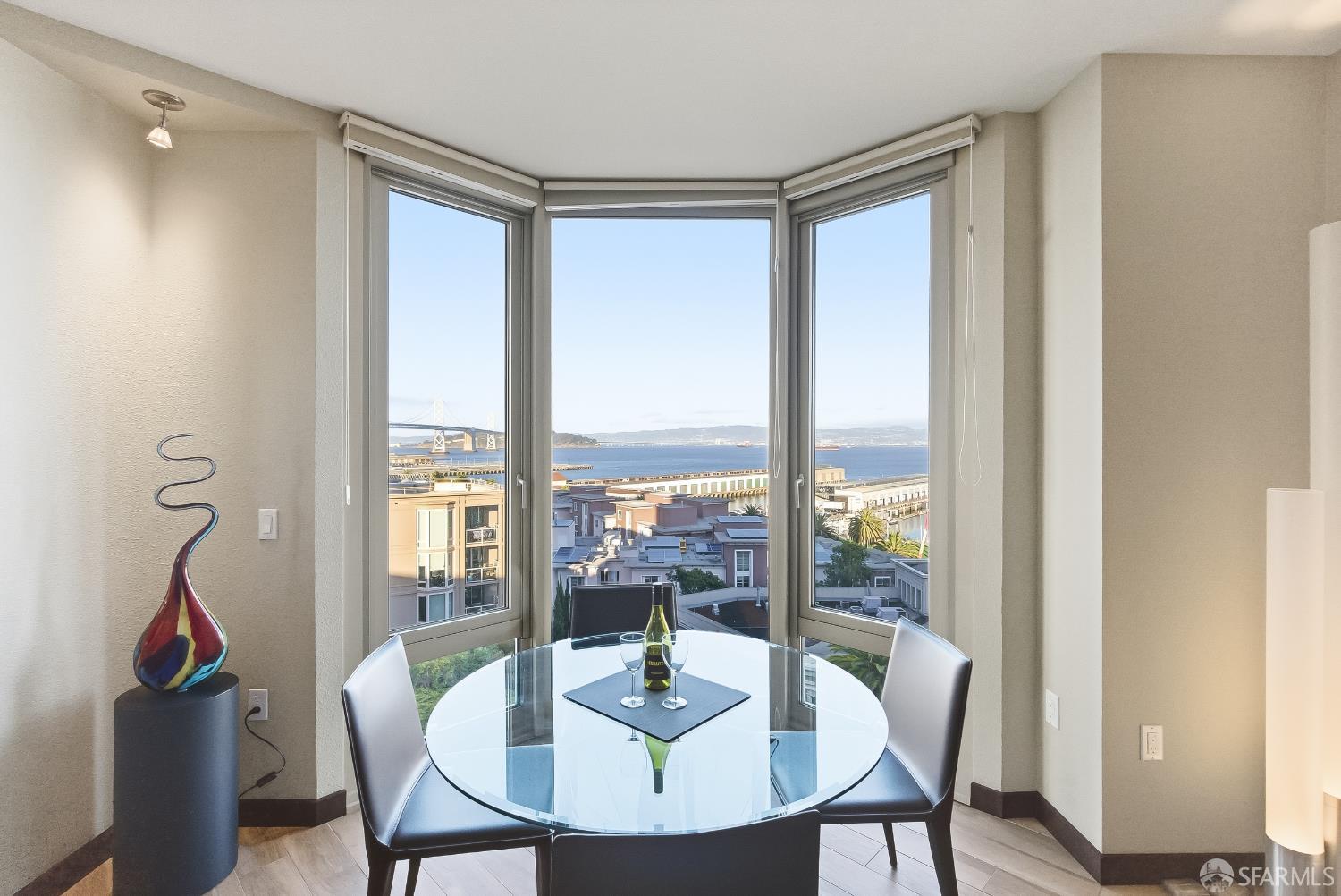 88 King Street, Unit 907 San Francisco, CA 94107 - Photo 9 of 51 dining room area overlooks The Embarcadero Waterfront