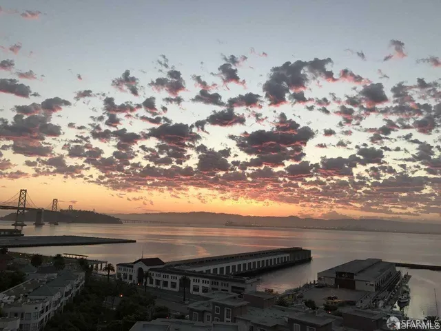 a view of city with tall buildings