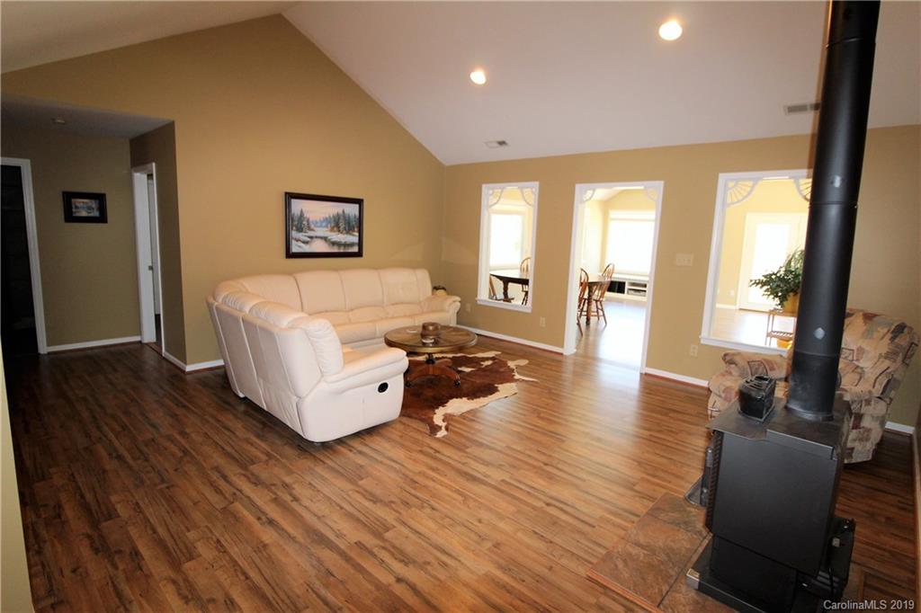 934 Beamguard Road Clover, SC 29710 - Photo 3 of 35 a living room with furniture and a wooden floor
