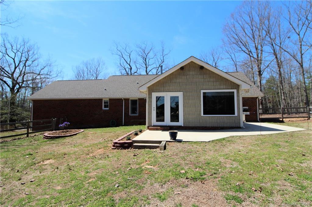 934 Beamguard Road Clover, SC 29710 - Photo 23 of 35 a front view of house with yard and trees in the background