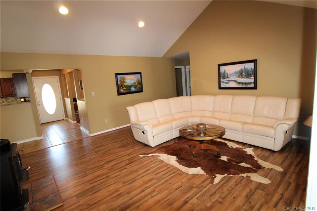 934 Beamguard Road Clover, SC 29710 - Photo 5 of 35 a living room with furniture and a wooden floor