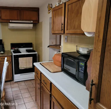 a bedroom with a bed and a mirror