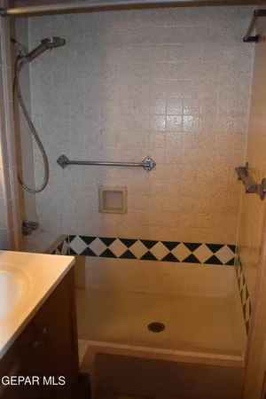 a view of a house with a yard and tree s