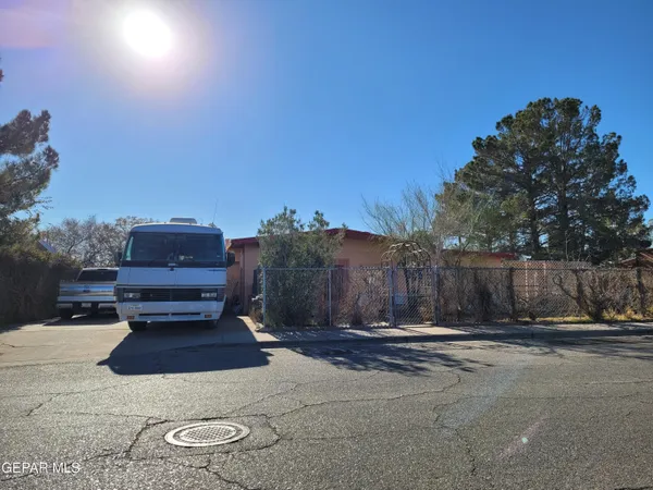 a dining room with furniture and chandelier or bathroom