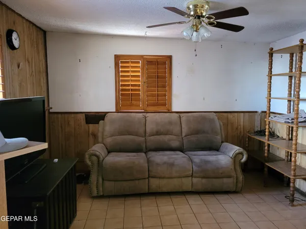 a kitchen with stainless steel appliances granite countertop a sink a stove and cabinets