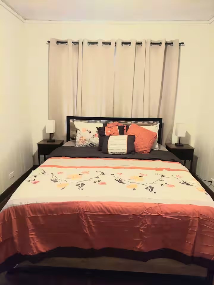 2824 5th Street Bay City, TX 77414 - Photo 11 of 17 a bedroom with a bed and a window