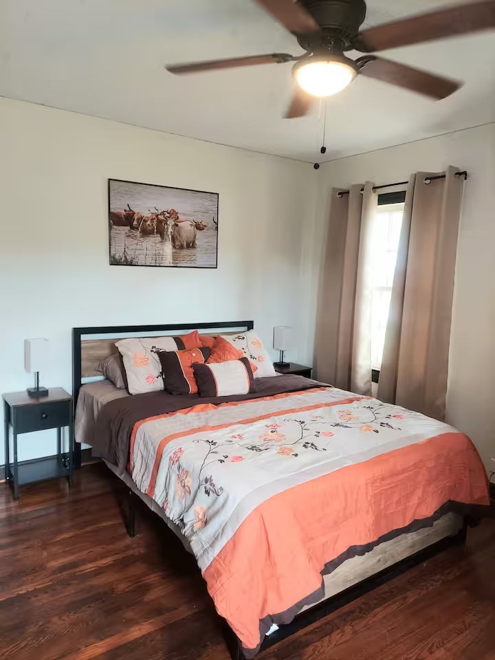 2824 5th Street Bay City, TX 77414 - Photo 12 of 17 a bedroom with bed and a window