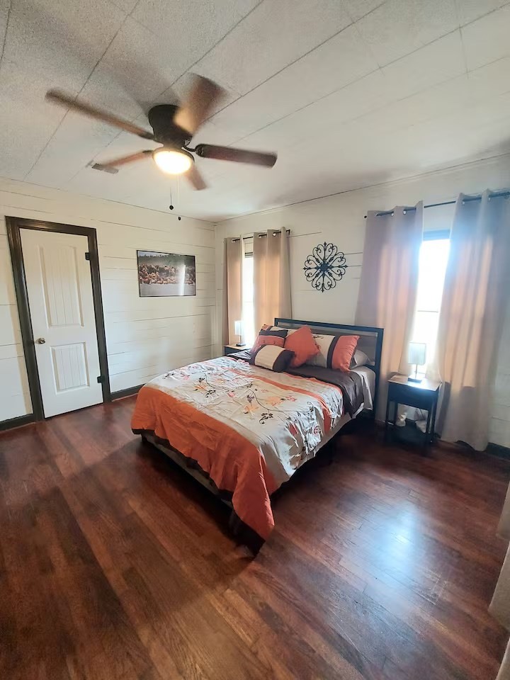 2824 5th Street Bay City, TX 77414 - Photo 13 of 17 a bedroom with a bed and a window