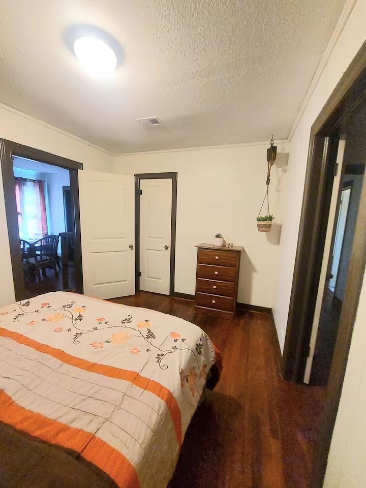 2824 5th Street Bay City, TX 77414 - Photo 15 of 17 a bedroom with a bed and a dresser